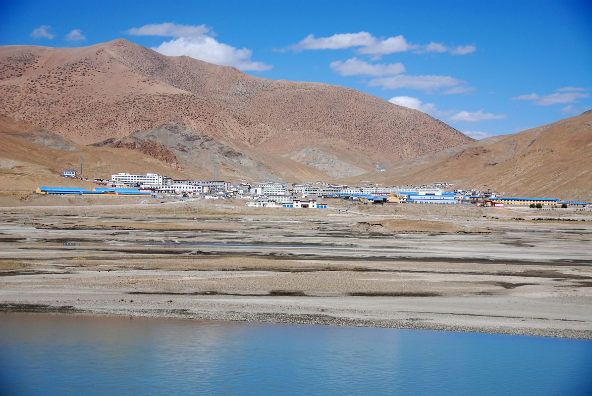 19 Saga Tibet From Across Yarlung Tsangpo Brahmaputra River Saga (4500m) is located across the Yarlung Tsangpo (Brahmaputra) River at the intersection of the roads connecting western Tibet with Lhasa and Nepal.